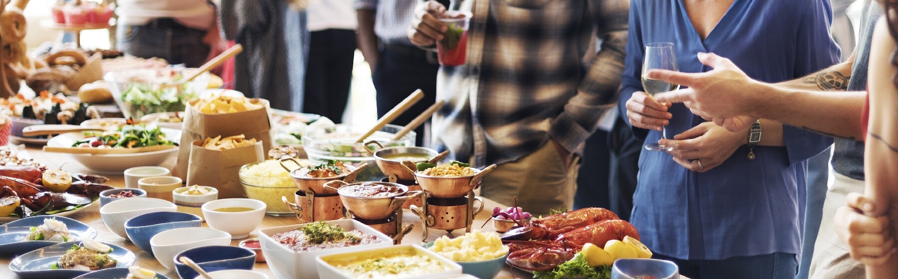 Corporate event catering buffet with guests